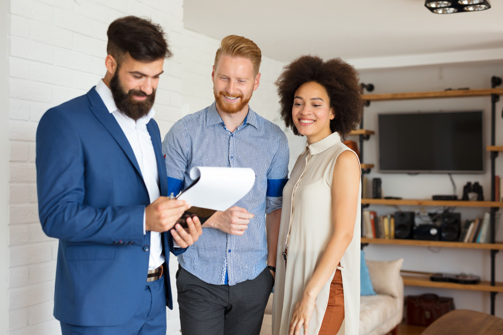 man and woman at an open house