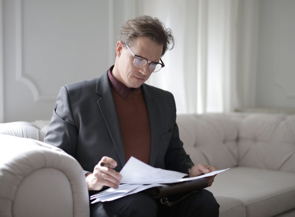 Man going over a document